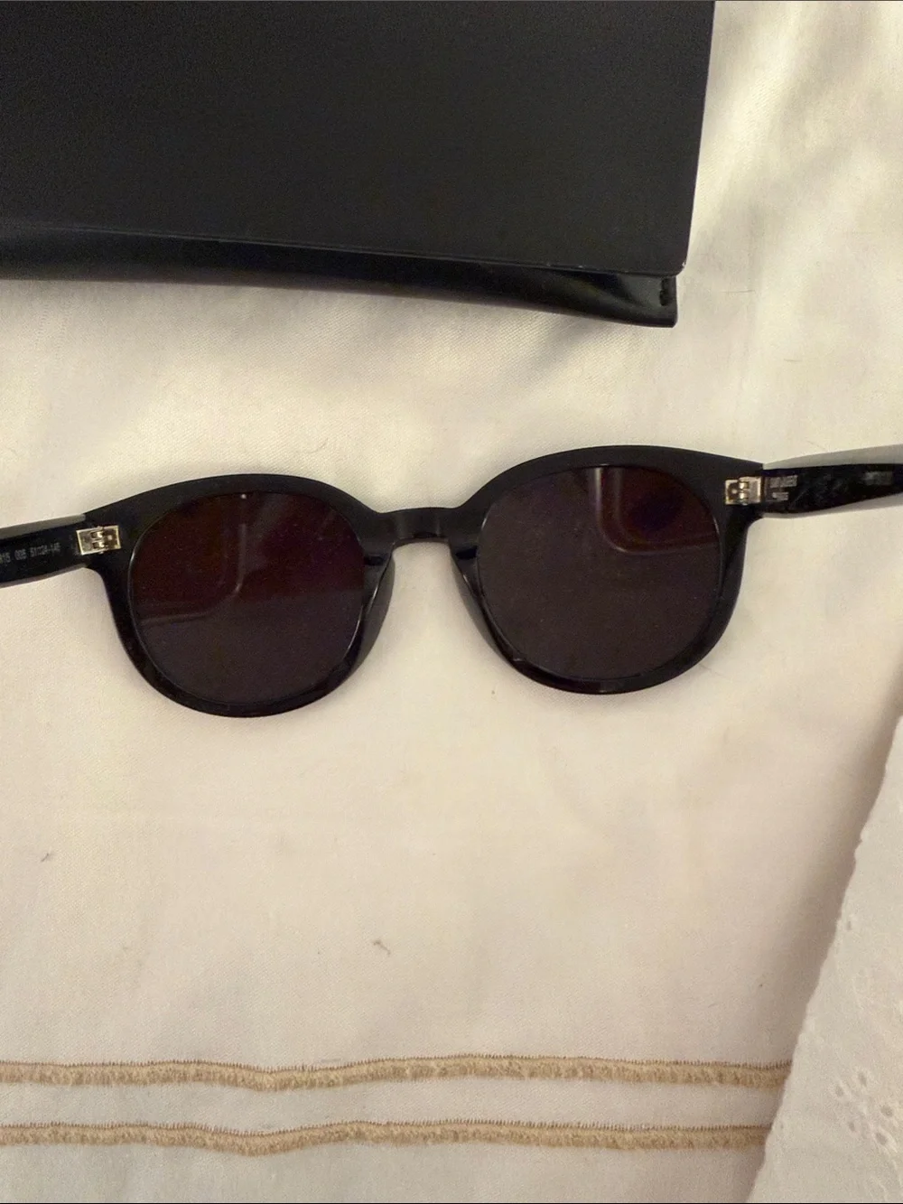 Saint Laurent Black Round Frame Sunglasses with Dark Lenses